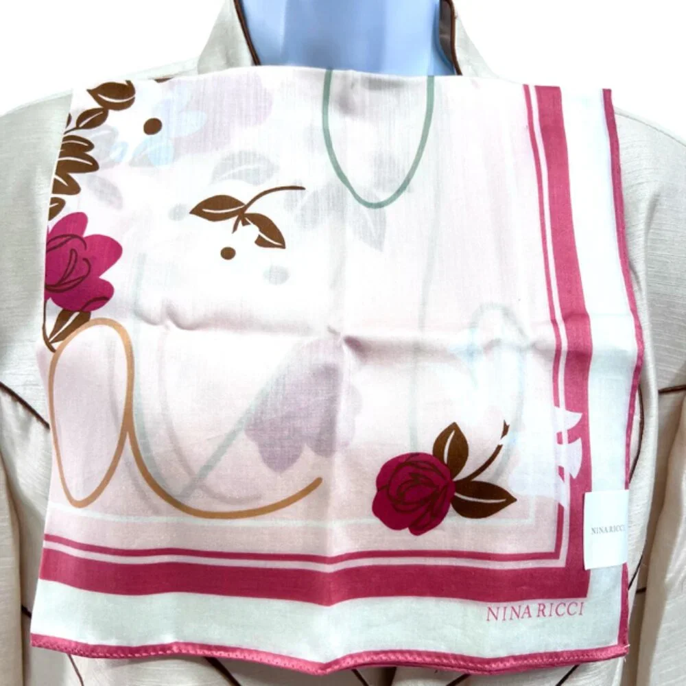 New  tag on Nina Ricci  scarf cotton/silk 22